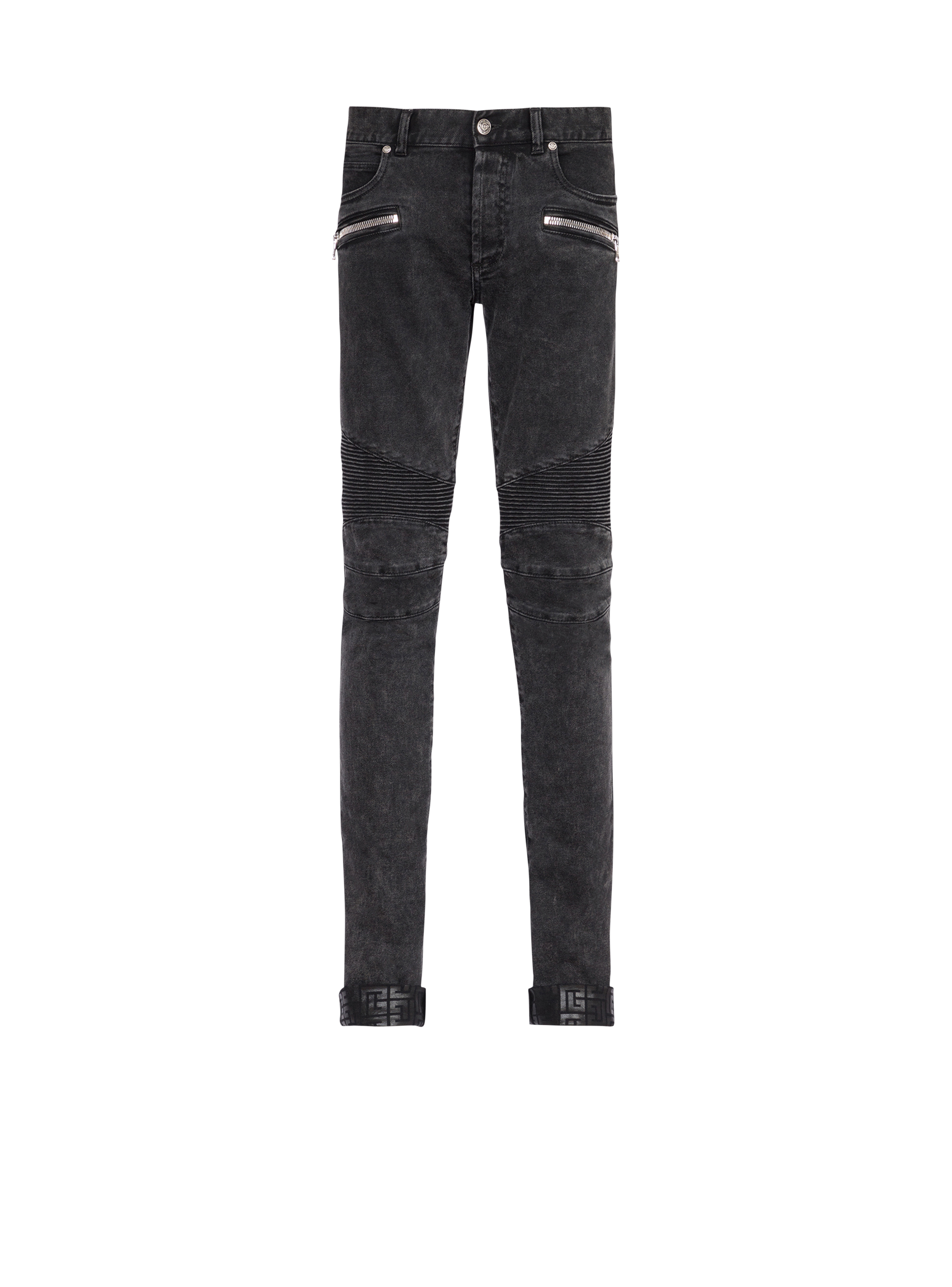 Slim Fit Jeans aus Baumwolle mit Bleach-Effekt, geriffelten Details und Balmain-Monogramm am Saum, schwarz